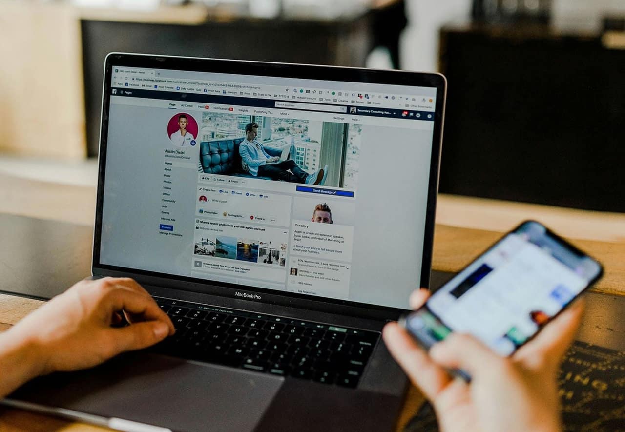 Paid media dashboard for Google and Meta ads on a laptop